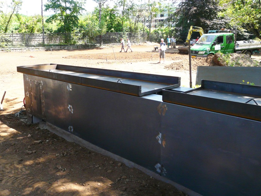 Couvre-murs corten soudés et assemblés sur mur béton